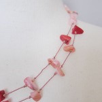 Long necklace with pink shells